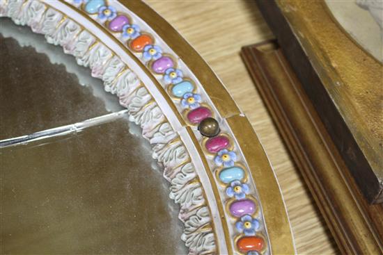 A Meissen porcelain dressing table mirror, surmounted with cherubs (a.f.), overall height 56cm